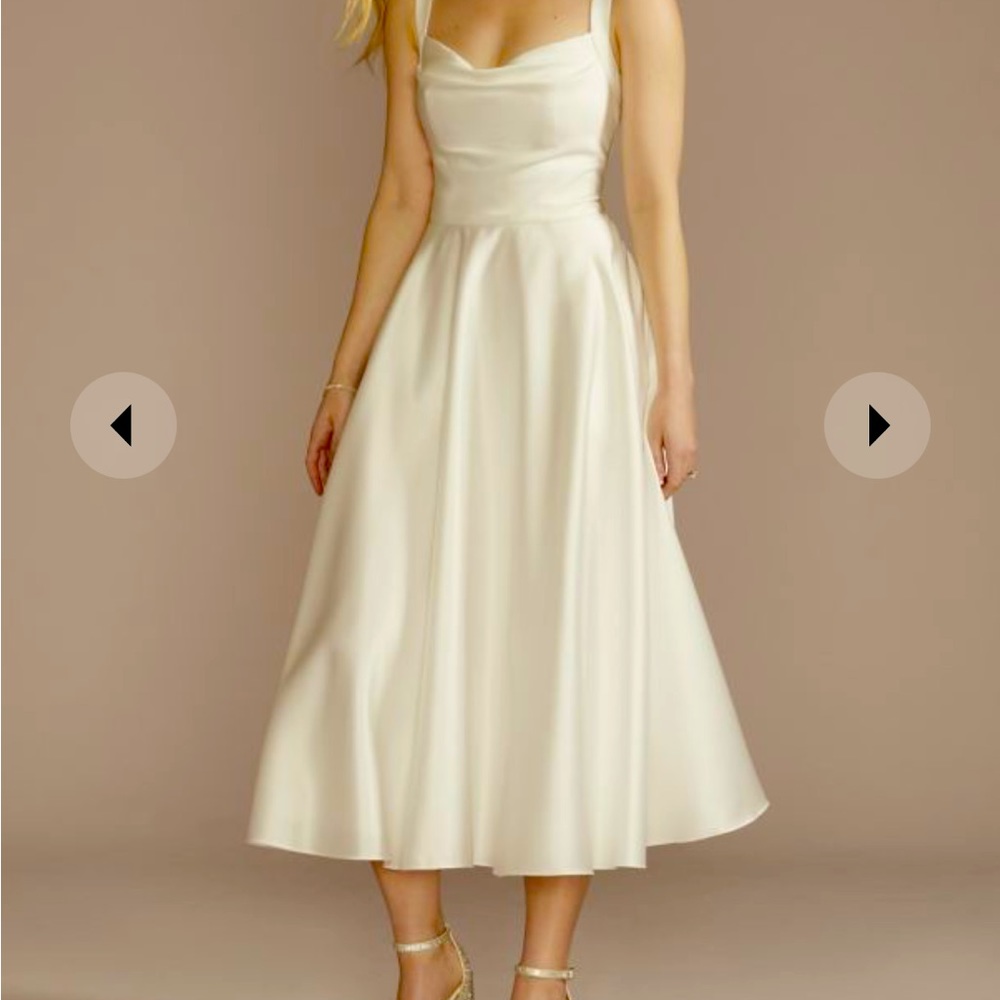Rehearsal dinner dress, elegant and classy, worn for a bridal photo shoot.